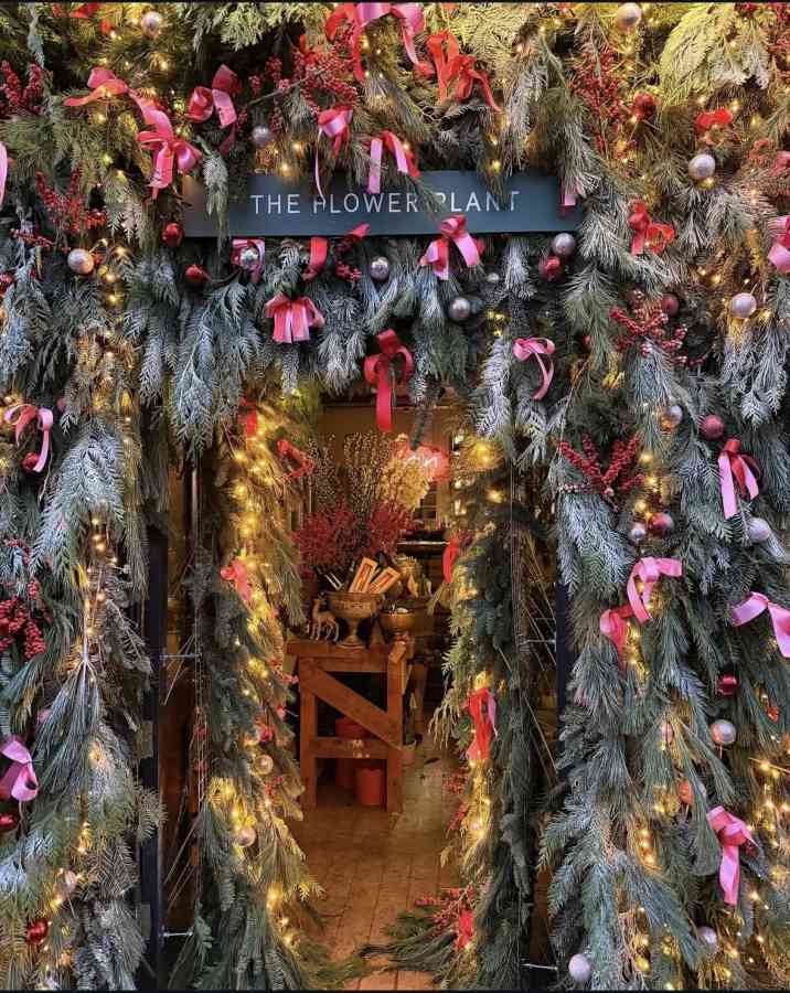 Christmas florist entrance garland spruce sugar pine doorway display 2025 the flower plant