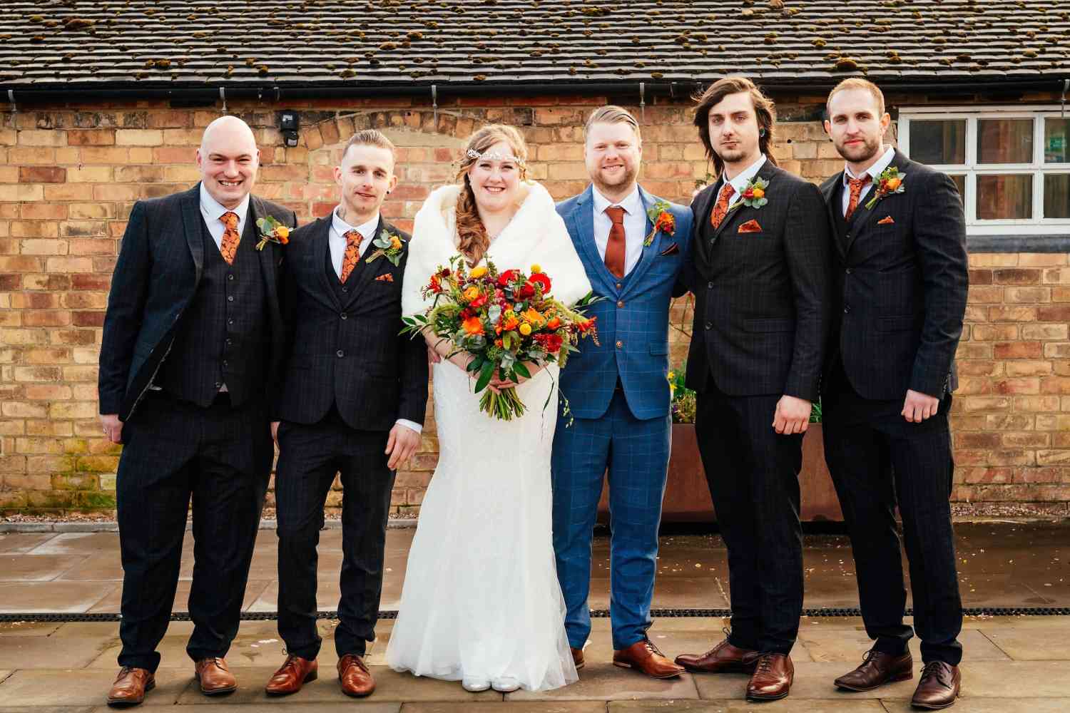 Bright Orange Wedding Bouquet And Buttonholes