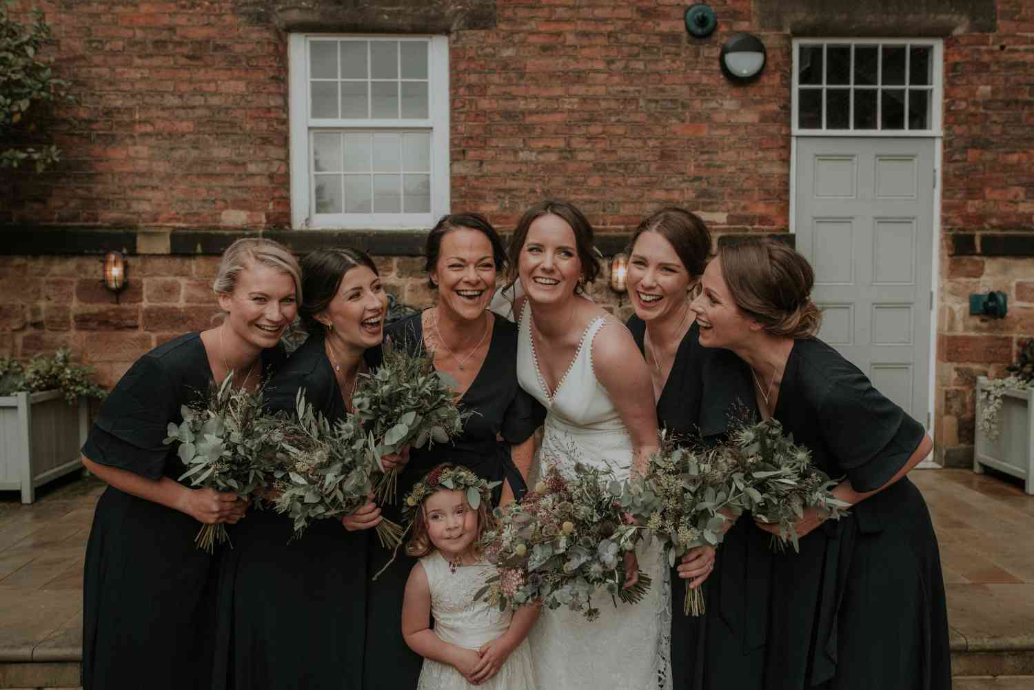 Bride and bridesmaides wild bouquets
