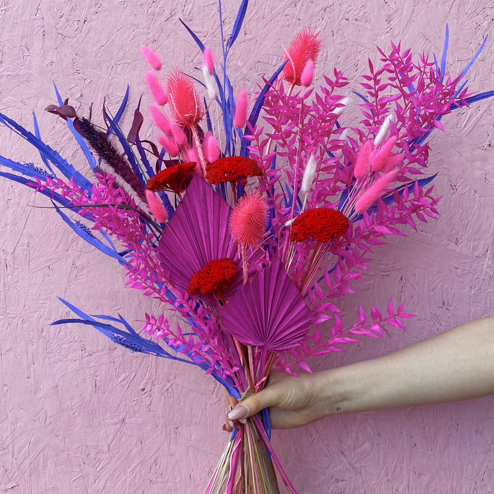 Dried hot pink, purple and red flowers