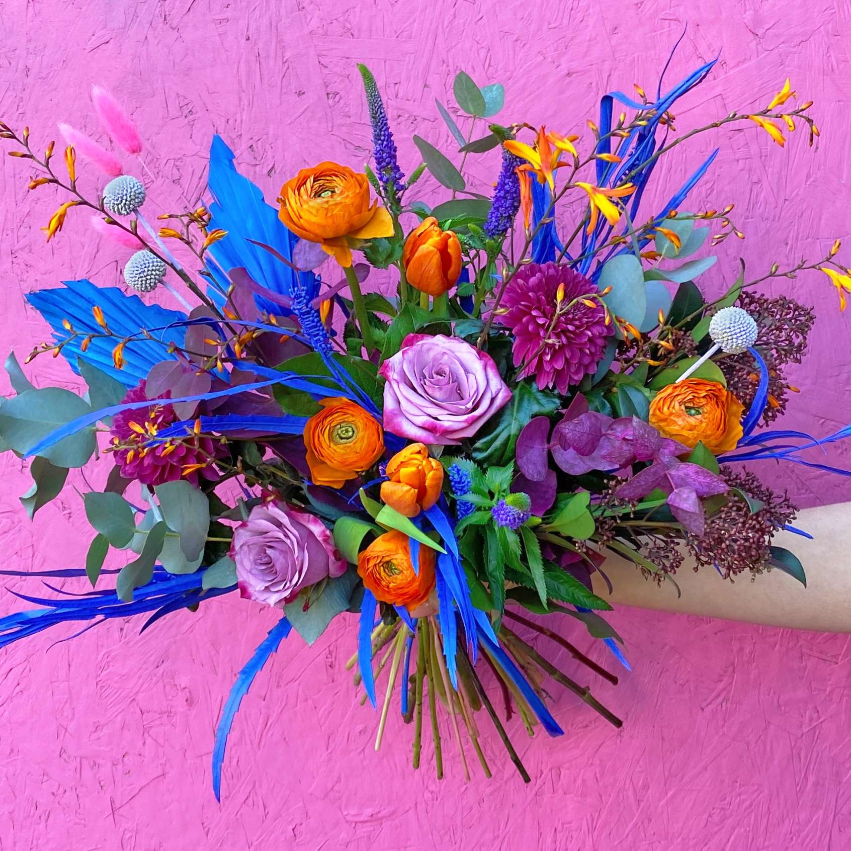 Pink, reds ranunculus, roses, tulips and eucalyptus - Valentine's flowers