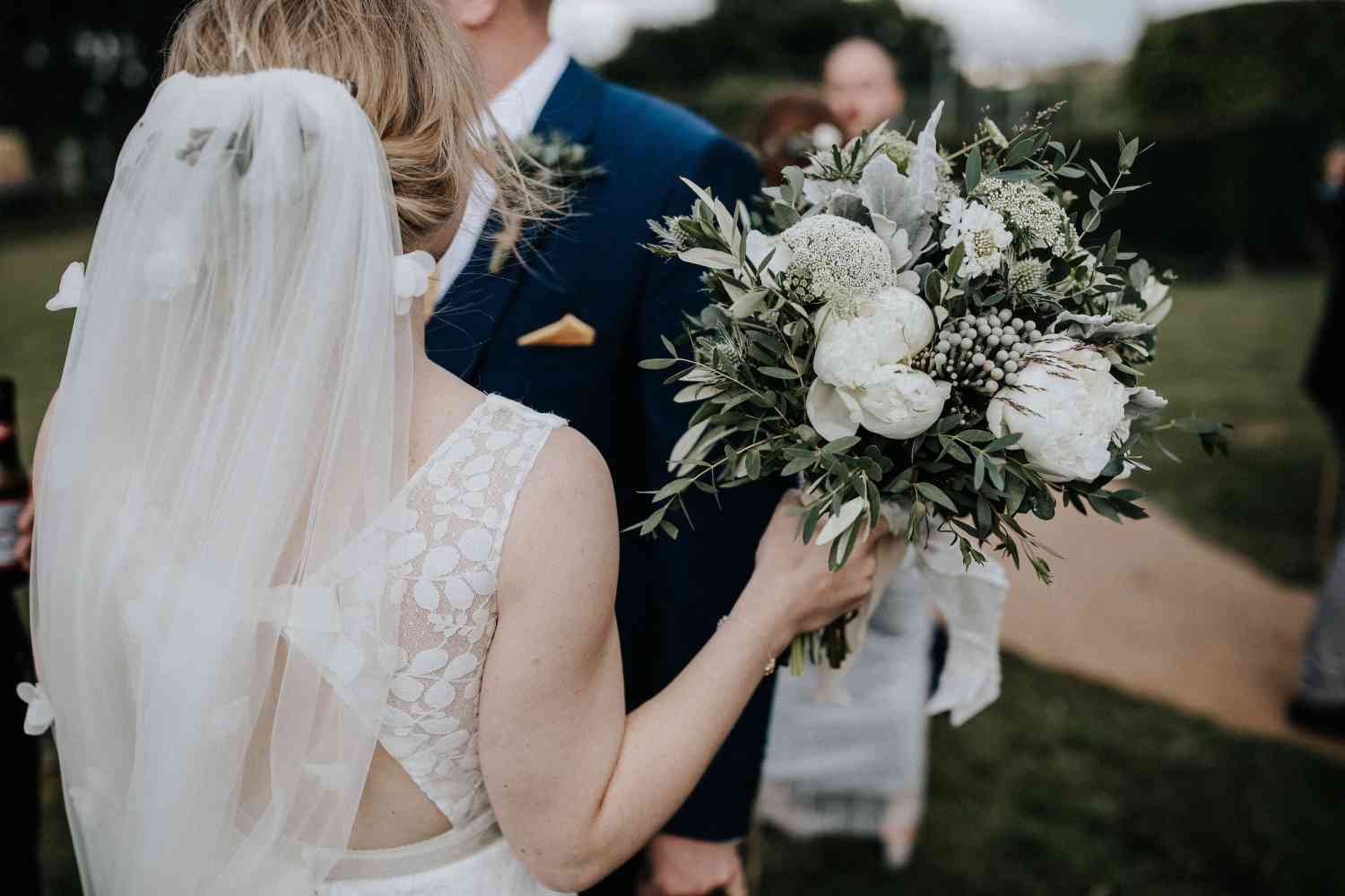 Bride just married white wild bouquet