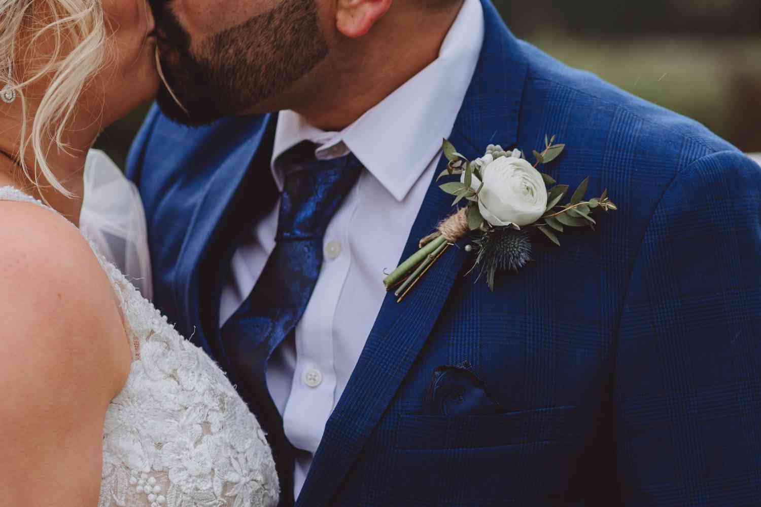 Simple White Ranunculus Buttonhole