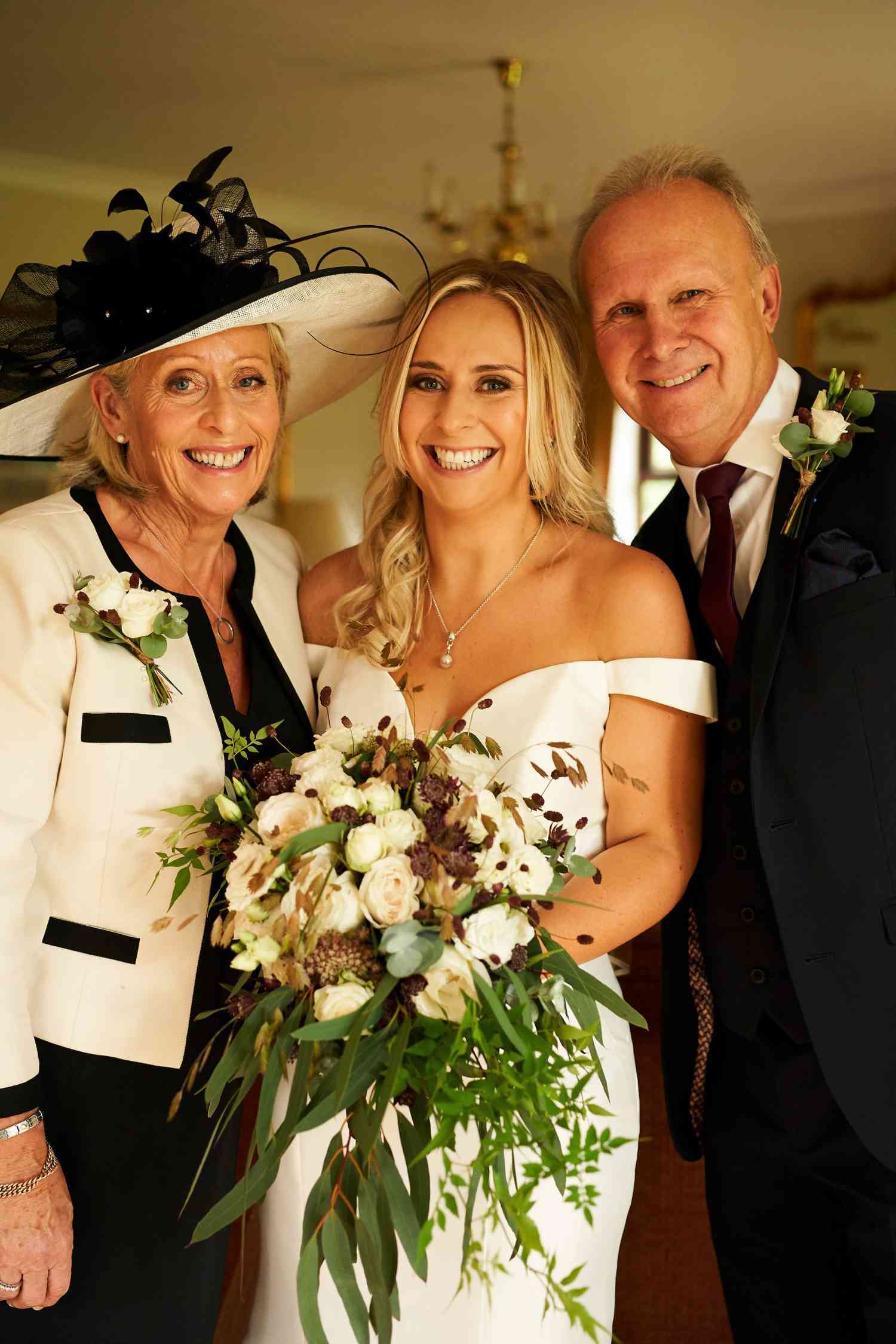 Wild trailing white bridal bouquet and button holes